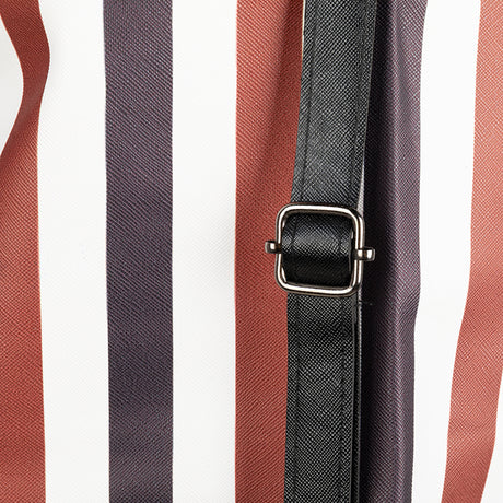 a black and white striped apron with a metal buckle