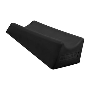 a black foam seat cushion on a white background