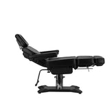 Pro Ink 604 Electric Tattoo Chair Black fully reclined, demonstrating its adaptability for various salon and tattoo procedures.