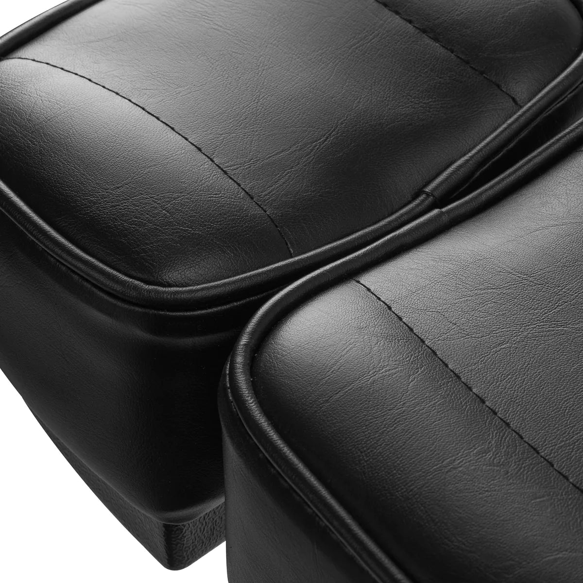 Close-up of Pro Ink 604 Electric Tattoo Chair Black leather upholstery, showcasing its premium quality and smooth finish.