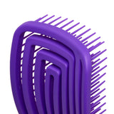 Detailed view of the Detangling O-327 Flexible Hair Brush purple spiral bristle pattern for smooth and tangle-free hair care.