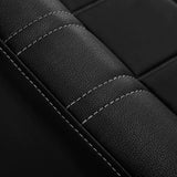 Close-up of Gabbiano Waiting Room Sofa Avila Black & Gold backrest stitching with fine detailing on black upholstery.