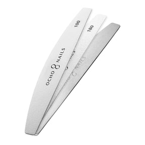 Ocho Nails Half-Moon Metal Core File with replaceable 100/180 grit papers, durable and ergonomic design for precise nail shaping.