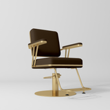Manufakturo Opéra styling chair in Cocoa Mocha with padded armrests, a gold-finished round base and metal footrest