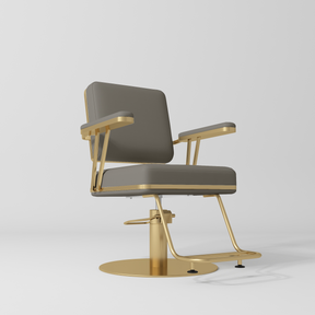 Manufakturo Opéra styling chair in Deep Ash with padded armrests, a gold-finished round base and metal footrest