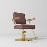 Manufakturo Opéra styling chair in Dusty Rose with padded armrests, a gold-finished round base and metal footrest