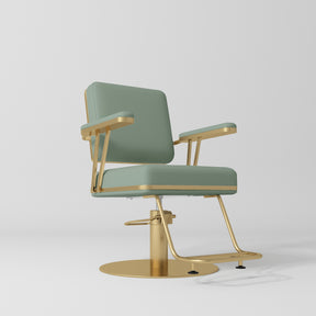 Manufakturo Opéra styling chair in Olive with padded armrests, a gold-finished round base and metal footrest