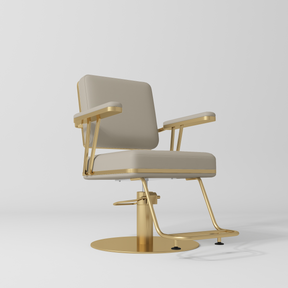 Manufakturo Opéra styling chair in Stone Taupe with padded armrests, a gold-finished round base and metal footrest
