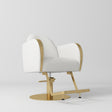 Manufakturo Regency styling chair with White upholstery, padded armrests, a round gold-finished base and metal footrest