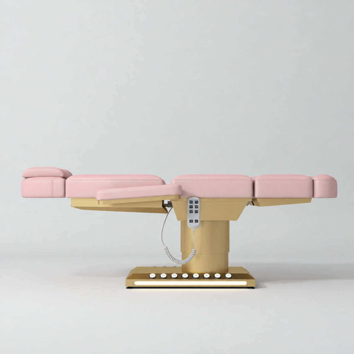 Manufakturo Aurélie beauty bed in Bare Blush with gold-finished base, flat side view.