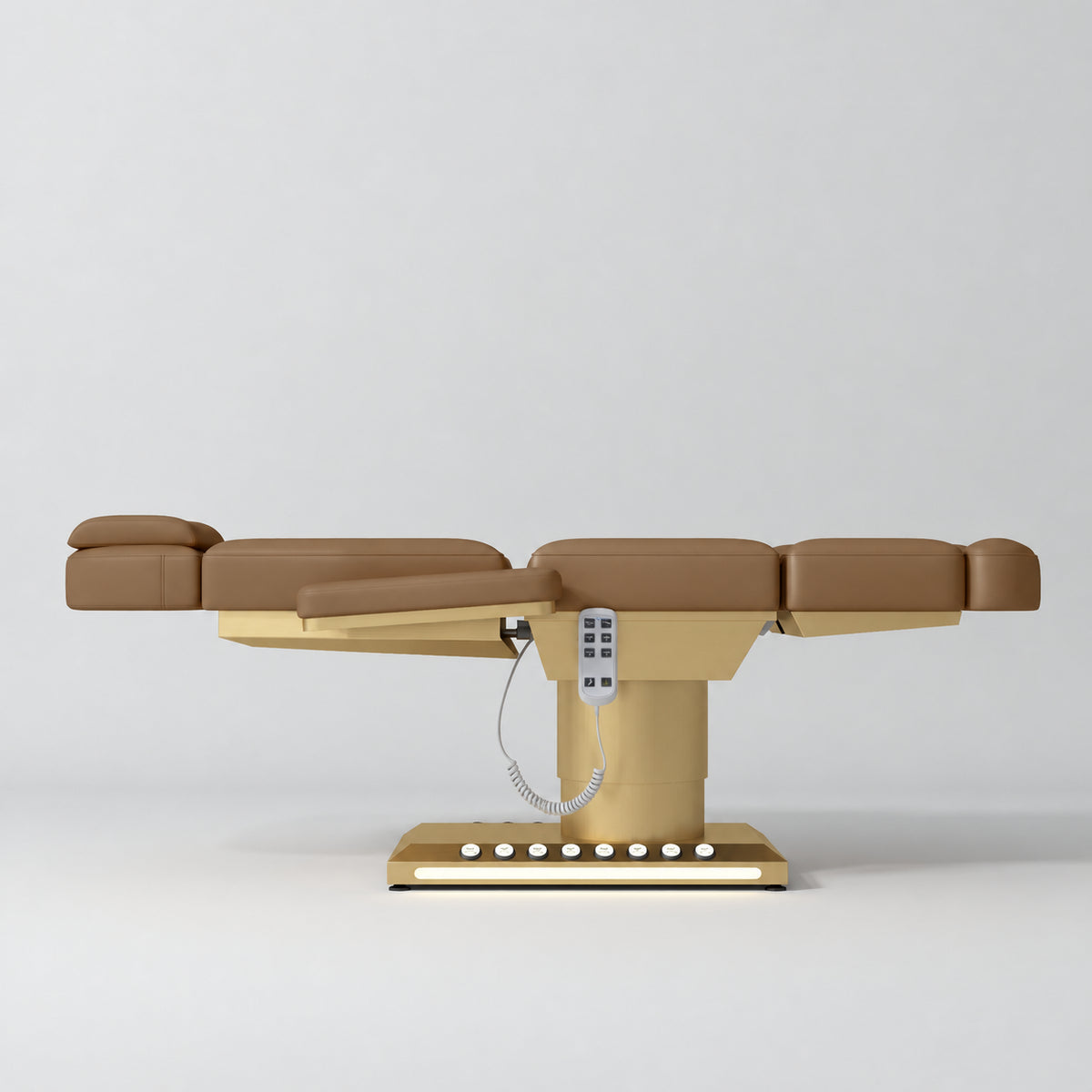 Manufakturo Aurélie beauty bed in Caramel with gold-finished base, flat side view.