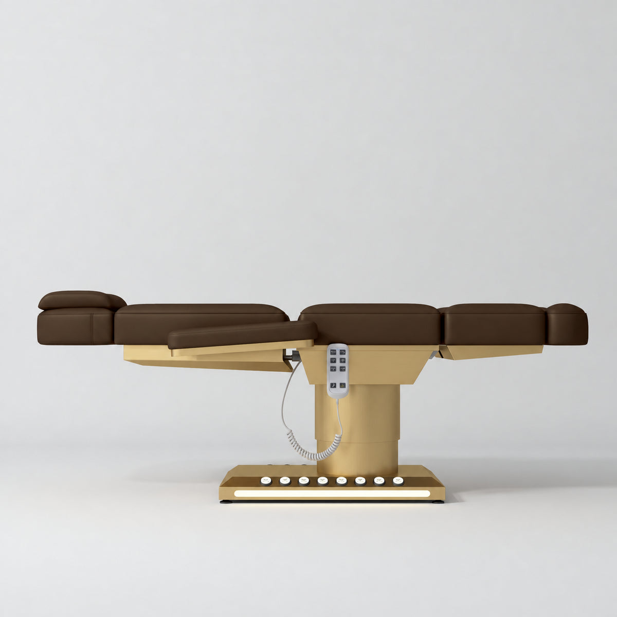 Manufakturo Aurélie beauty bed in Cocoa Mocha with gold-finished base, flat side view.