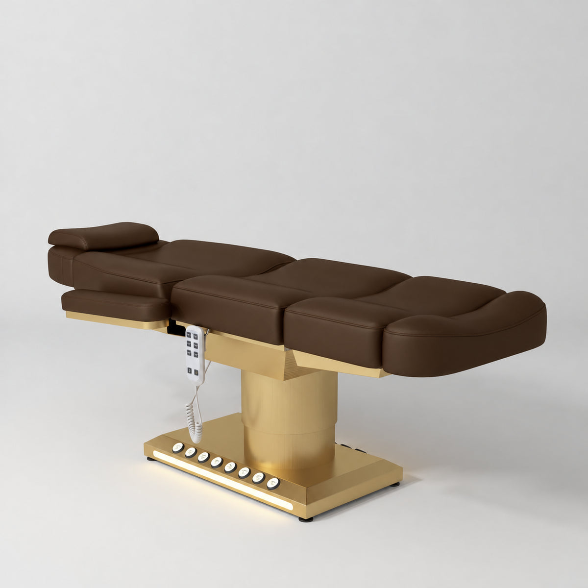 Manufakturo Aurélie beauty bed in Cocoa Mocha with gold-finished base, flat view from above at an angle.