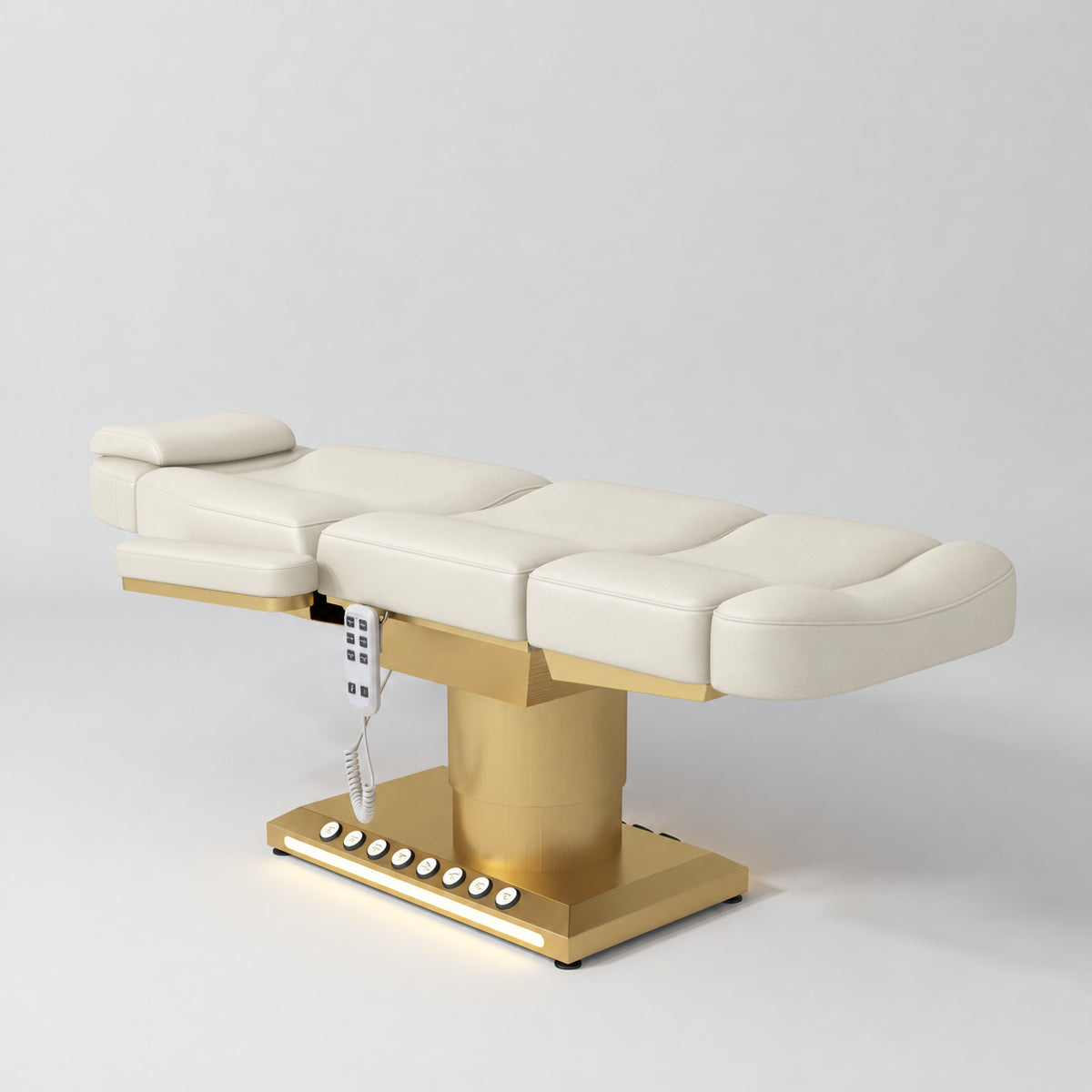 Manufakturo Aurélie beauty bed in Creamy with gold-finished base, flat view from above at an angle.