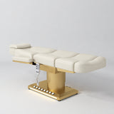 Manufakturo Aurélie beauty bed in Creamy with gold-finished base, flat view from above at an angle.