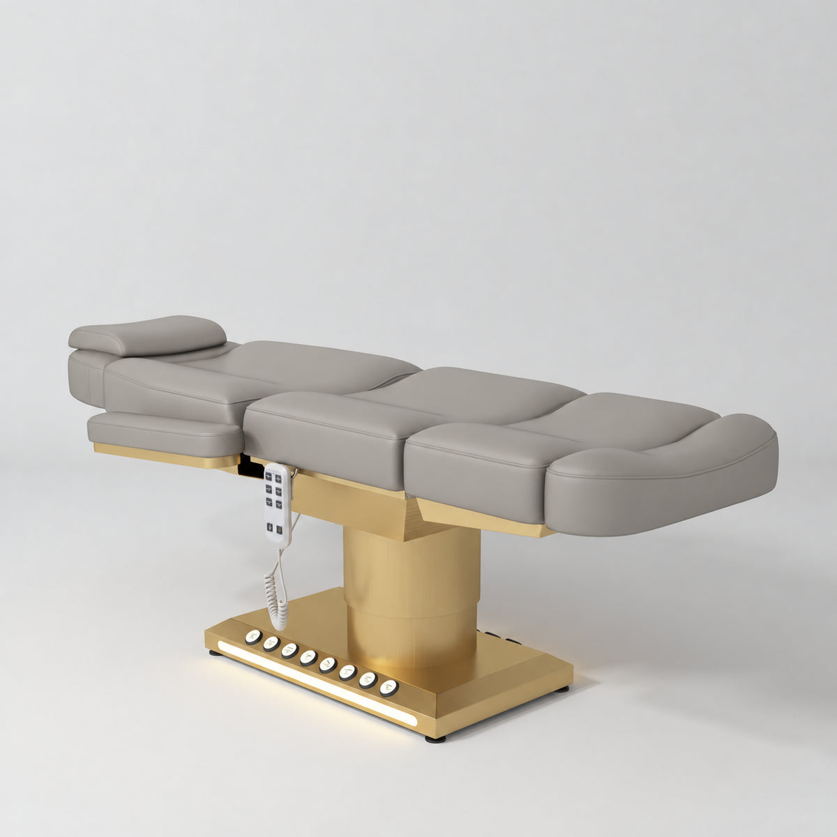 Manufakturo Aurélie beauty bed in Pearl Greige with gold-finished base, flat view from above at an angle.
