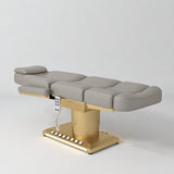 Manufakturo Aurélie beauty bed in Pearl Greige with gold-finished base, flat view from above at an angle.