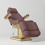 Manufakturo Aurélie beauty bed in Dusty Rose with gold-finished base, reclined front three-quarter view.