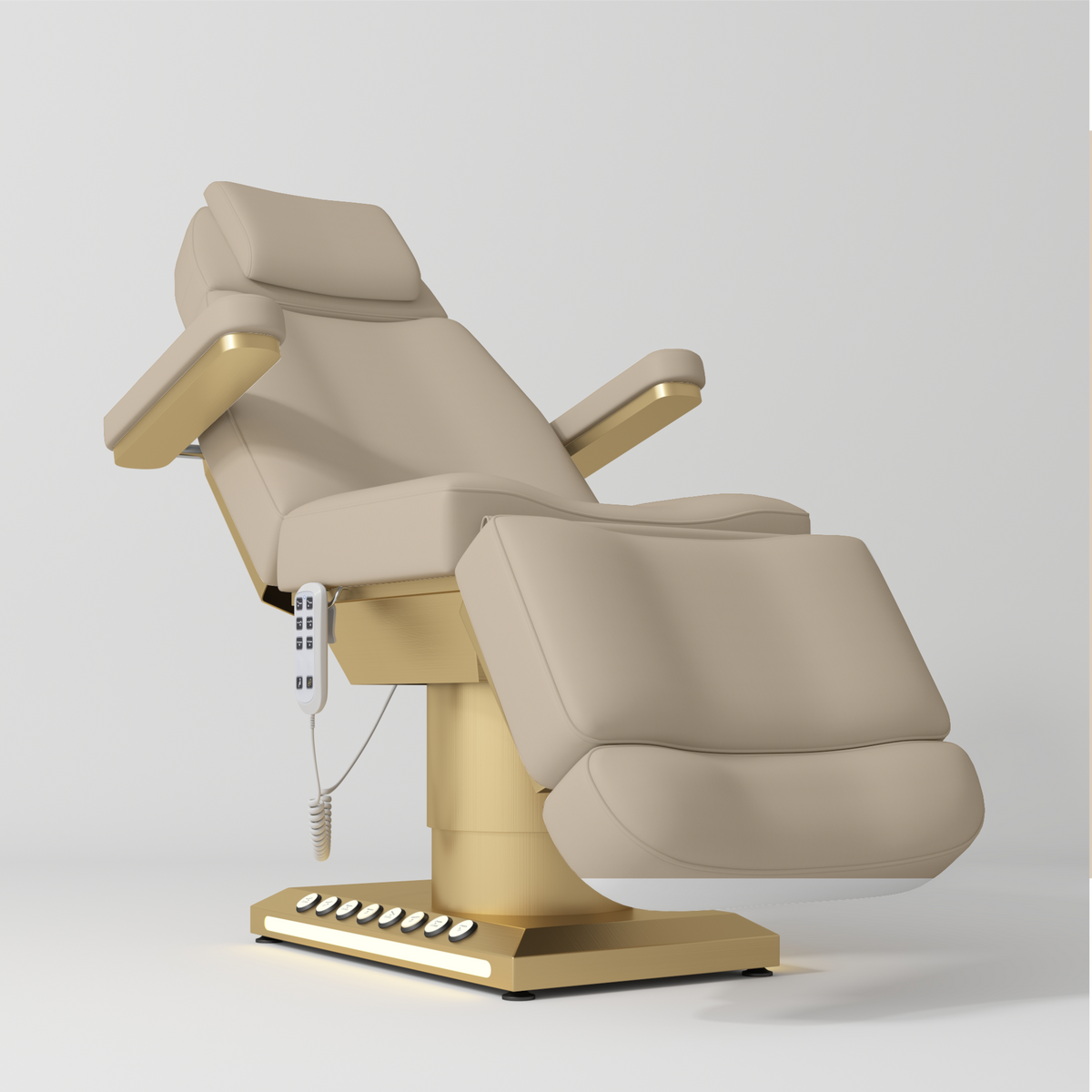 Manufakturo Aurélie beauty bed in Warm Beige with gold-finished base, reclined front three-quarter view.
