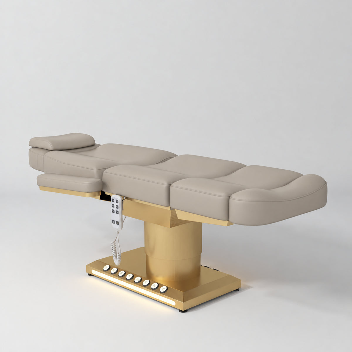 Manufakturo Aurélie beauty bed in Stone Taupe with gold-finished base, flat view from above at an angle.