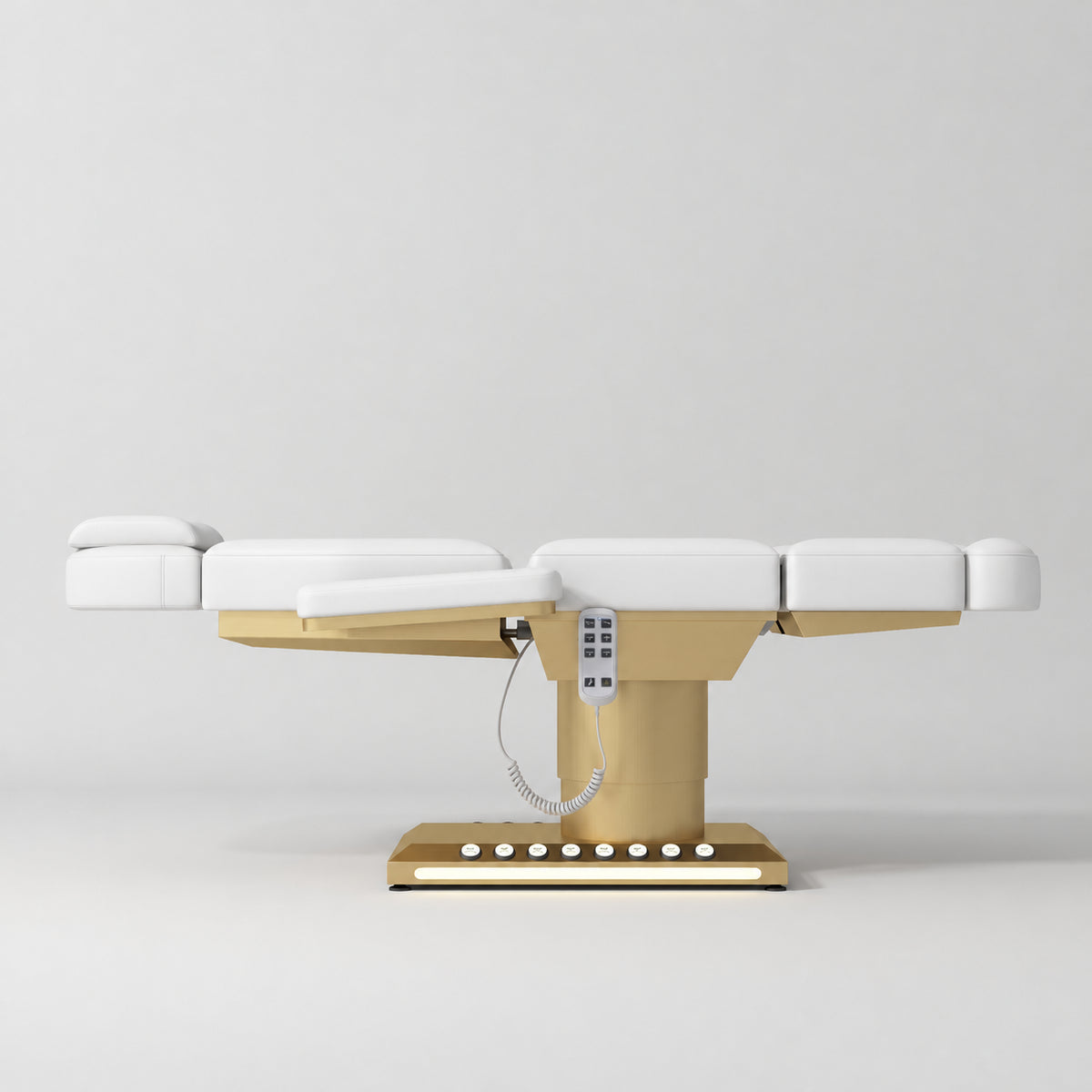 Manufakturo Aurélie beauty bed in White with gold-finished base, flat side view.