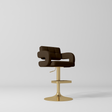 Manufakturo Mirae bar stool in Cocoa Mocha with a panelled backrest, upholstered armrests and a gold-finished pedestal base and footrest