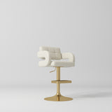 Manufakturo Mirae bar stool in Creamy with a panelled backrest, upholstered armrests and a gold-finished pedestal base and footrest