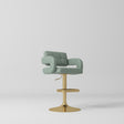 Manufakturo Mirae bar stool in Olive with a panelled backrest, upholstered armrests and a gold-finished pedestal base and footrest