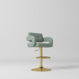 Manufakturo Mirae bar stool in Olive with a panelled backrest, upholstered armrests and a gold-finished pedestal base and footrest