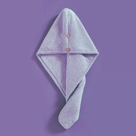 Purple microfiber hair towel with a button closure, perfect for drying and maintaining high porosity hair.