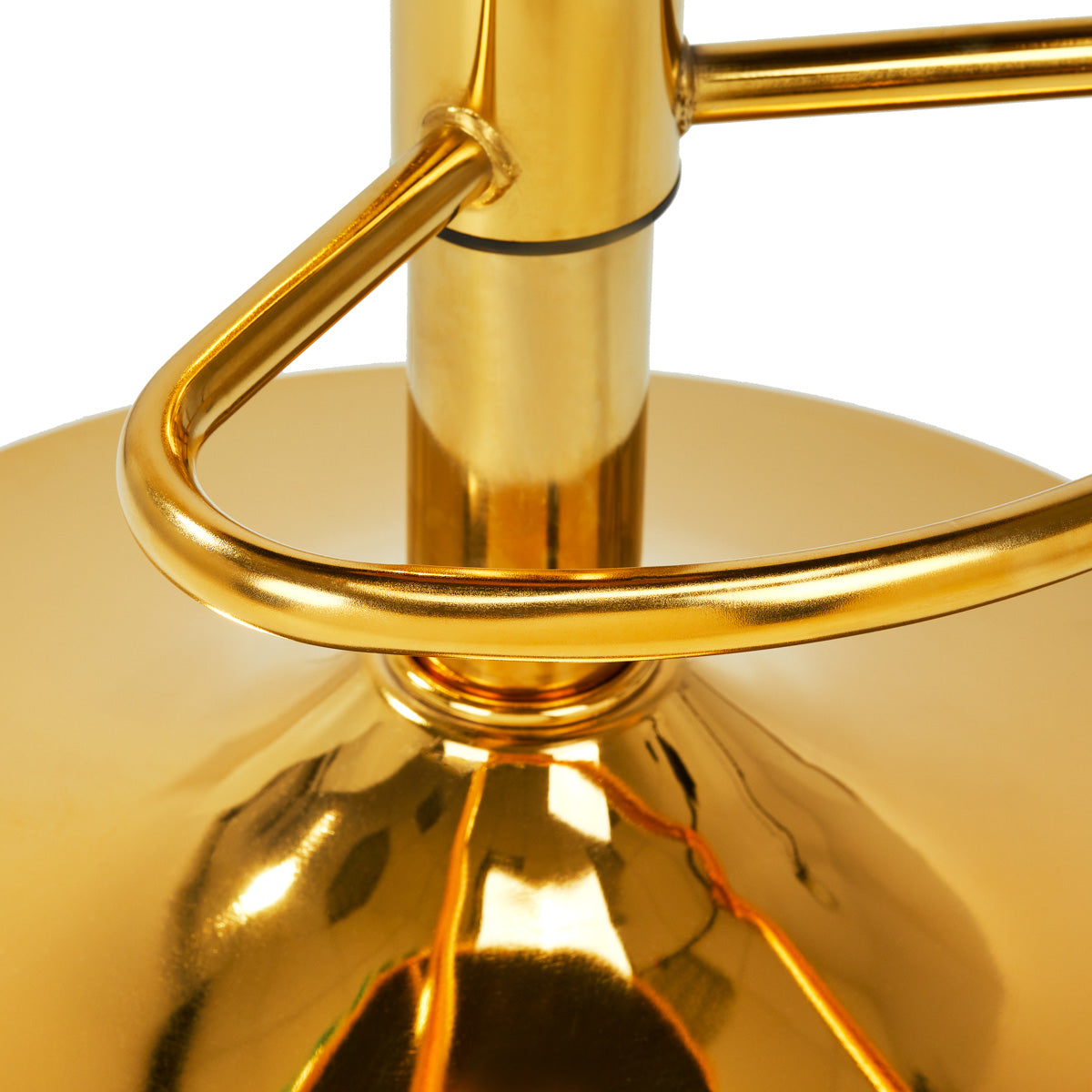 a close up of a golden lamp on a white background