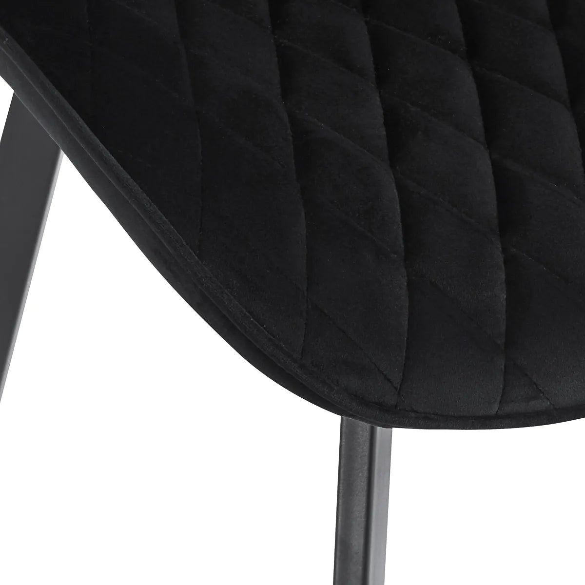 4Rico Vetro Quilted Reception Chair Black With Black Legs - displayed in a professional treatment-room setting