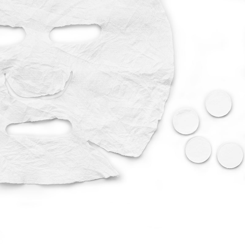 ActiveShop Disposable Non-Woven Compressed Mask 10 pcs - open cosmetic jar with its lid on a white background