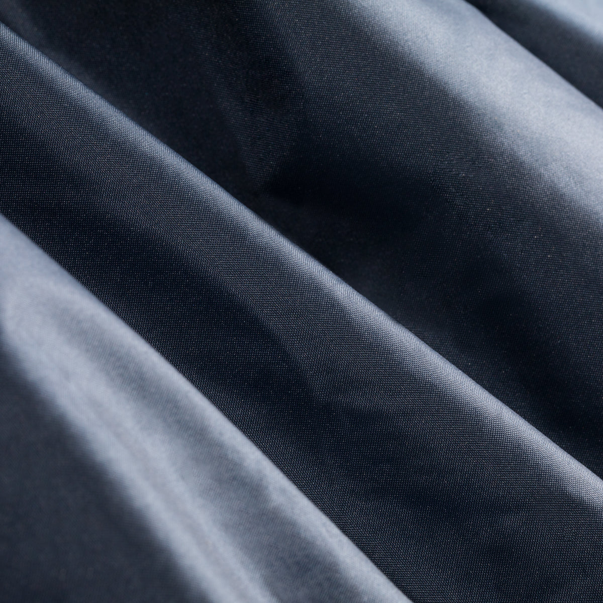 ActiveShop J-120 Hairdressing Cape - product displayed with its packaging on a dark background