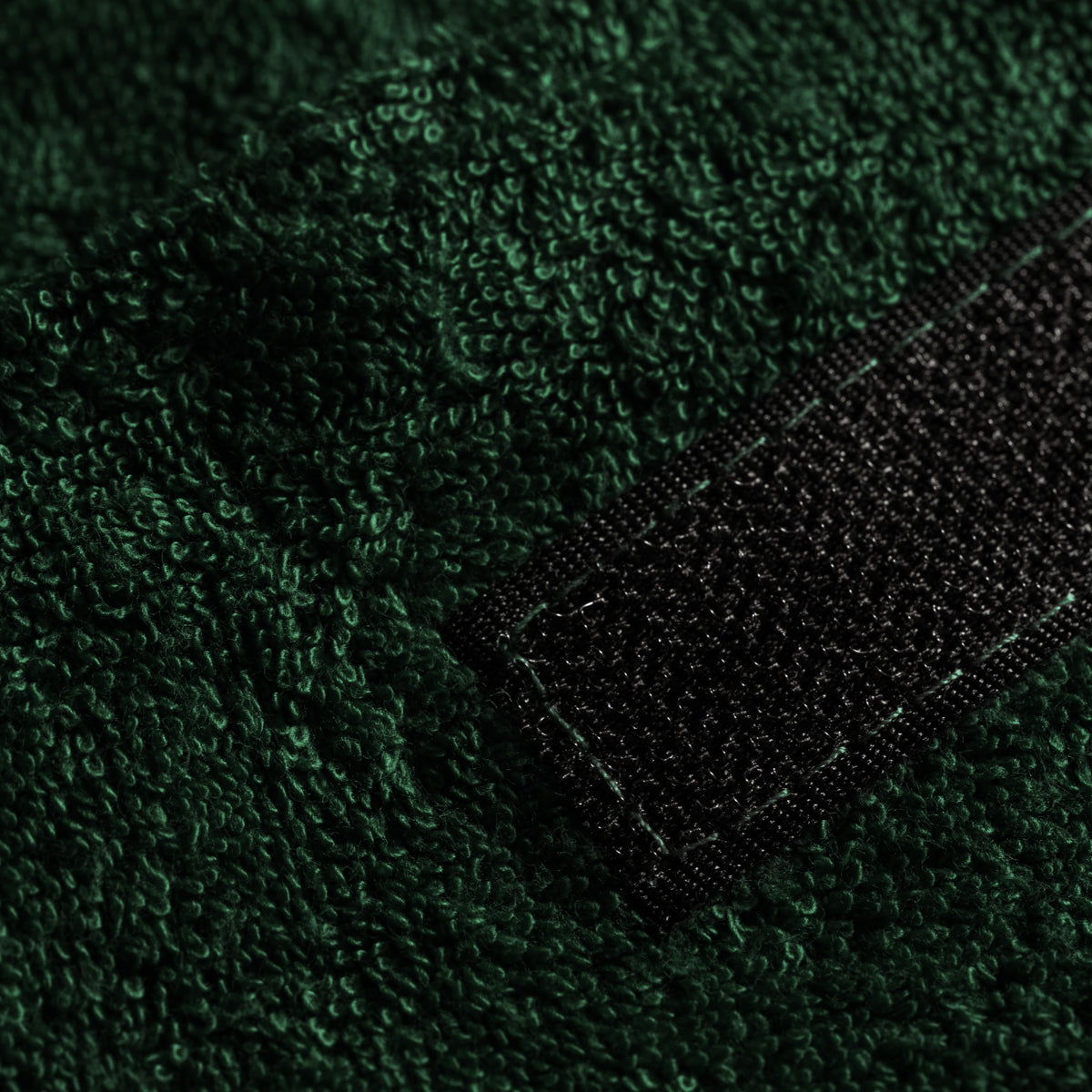 ActiveShop Terry Cosmetic Headband Bottle Green - product displayed with its packaging on a dark background