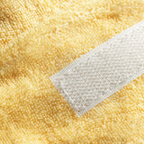 ActiveShop Terry Cosmetic Headband Yellow - product displayed with its packaging on a dark background