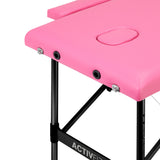 ActivFizjo Comfort Lux 2-Section Aluminium Folding Massage Table Pink & Black - displayed in a professional treatment-room setting