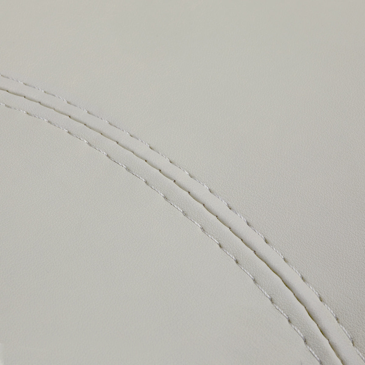 Close-up of grey faux leather upholstery and stitched seam on Azzurro Special 152