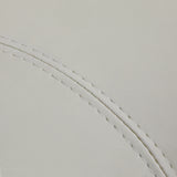 Close-up of grey faux leather upholstery and stitched seam on Azzurro Special 152