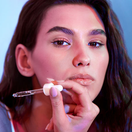 Body Boom Face Boom Skin Dopamine Stimulating Anti-Wrinkle Serum With 0.15% Retinol - finished result shown on a model's face