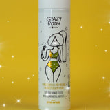 Crazy Hair Crazy Body Illuminating Bath & Shower Liquid Pina Colada - product displayed with its packaging on a dark background