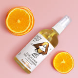 Crazy Hair Low & Medium Porosity Hair Oiling Treatment Orange (EXP 10/2026) - product displayed with its packaging on a dark background