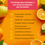 Eveline Vitamin C Moisturising & Protective Face Cream SPF50 - close-up of the cosmetic finish on skin