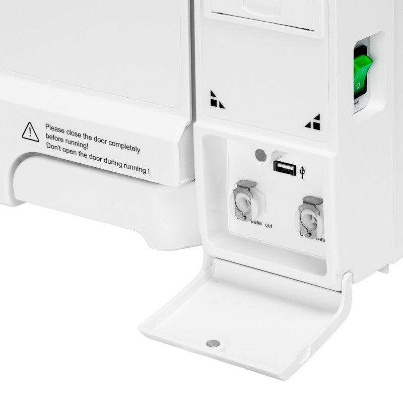 Fomos Foster 12L autoclave: USB port and water drainage connections behind the front cover