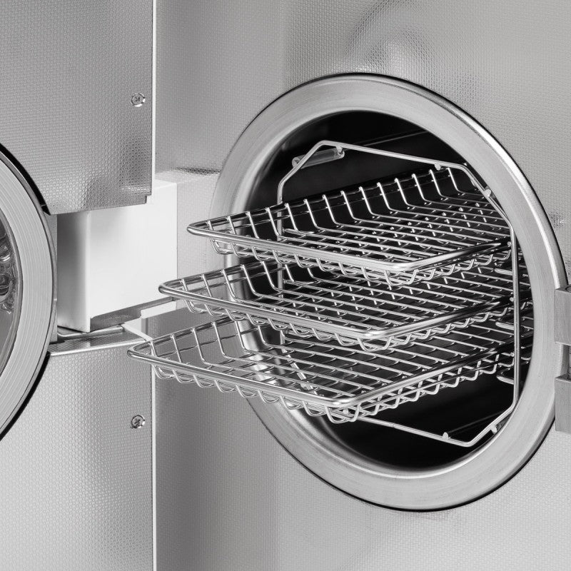 Fomos Foster 8L autoclave: open chamber with the three-tier tray rack extended
