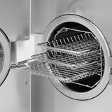 Fomos Foster 8L autoclave: open chamber with the three-tier tray rack extended