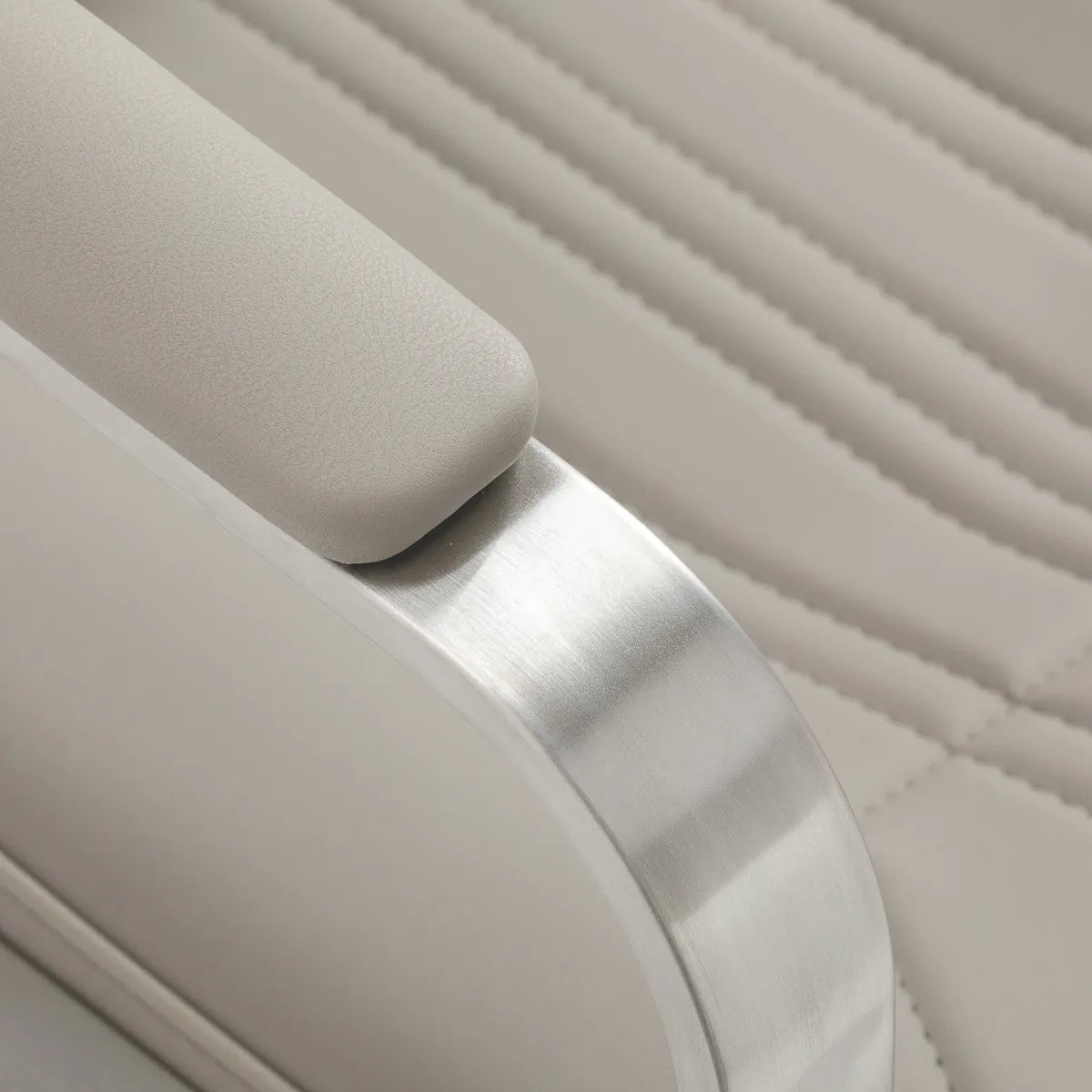 Gabbiano Acri Hair Salon Styling Chair Beige With Silver Base - close-up of the upholstery and construction details