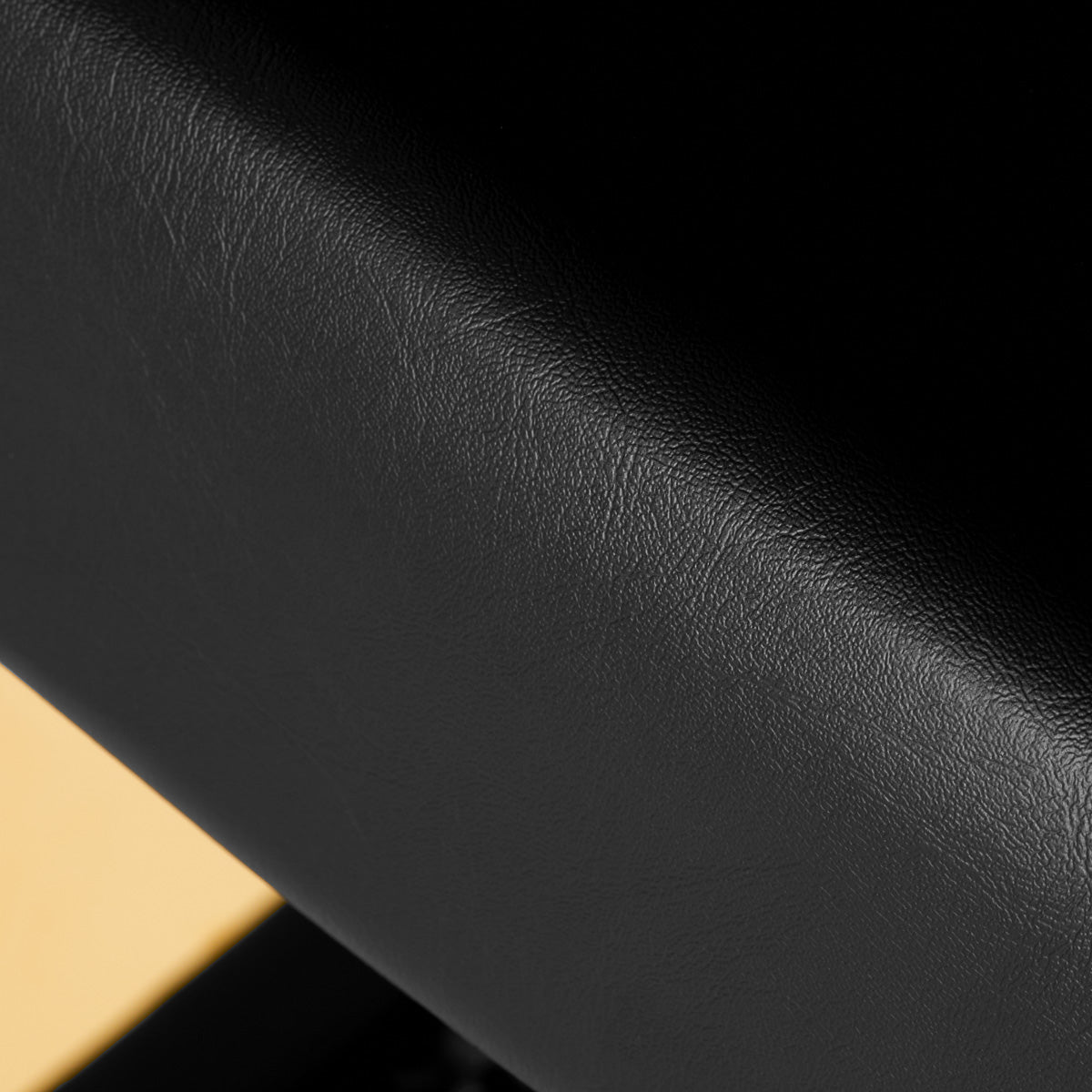 Gabbiano Hairdressing Chair Turyn Black Gold - close-up of the upholstery and construction details