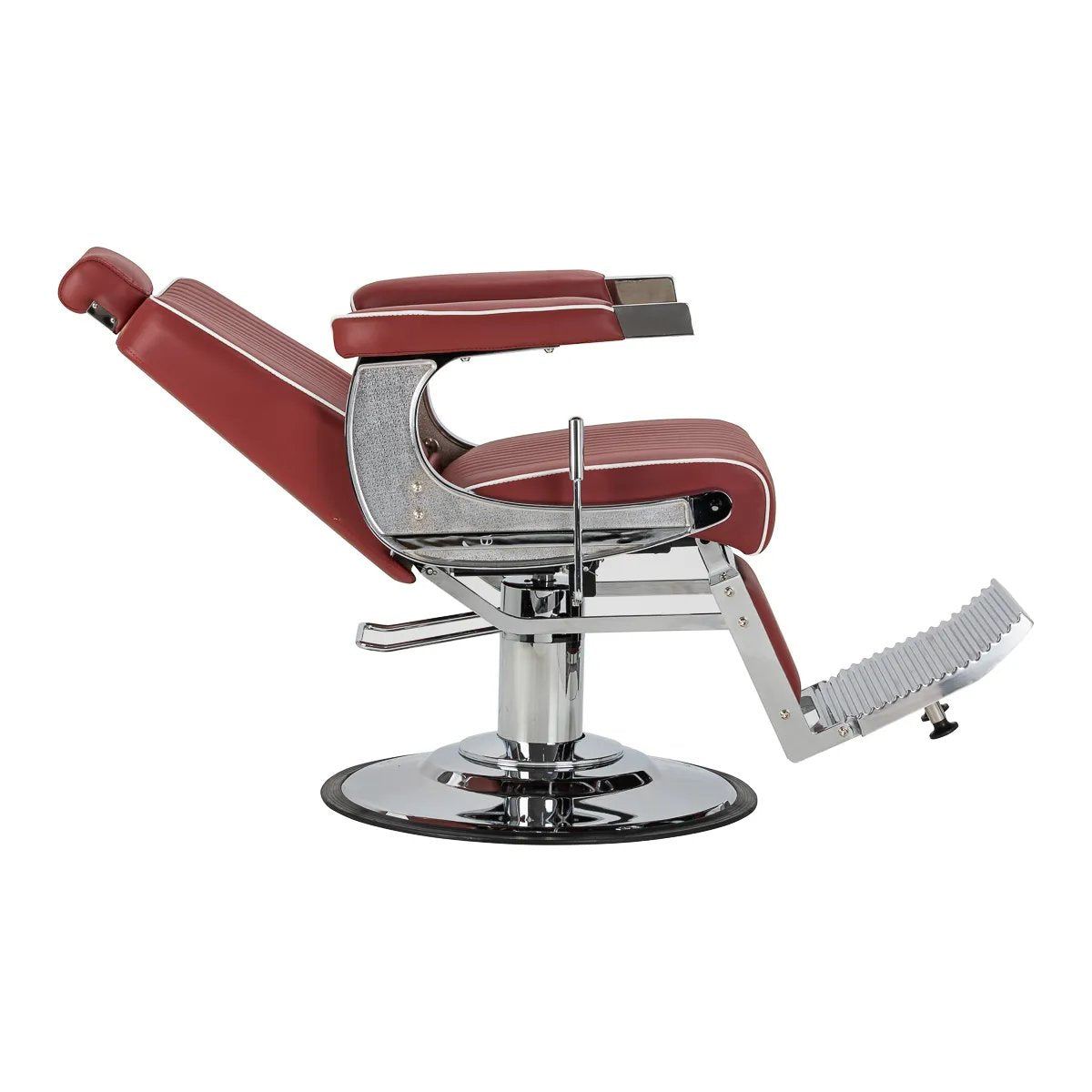 Gabbiano Visionerio red barber chair fully reclined with raised footrest