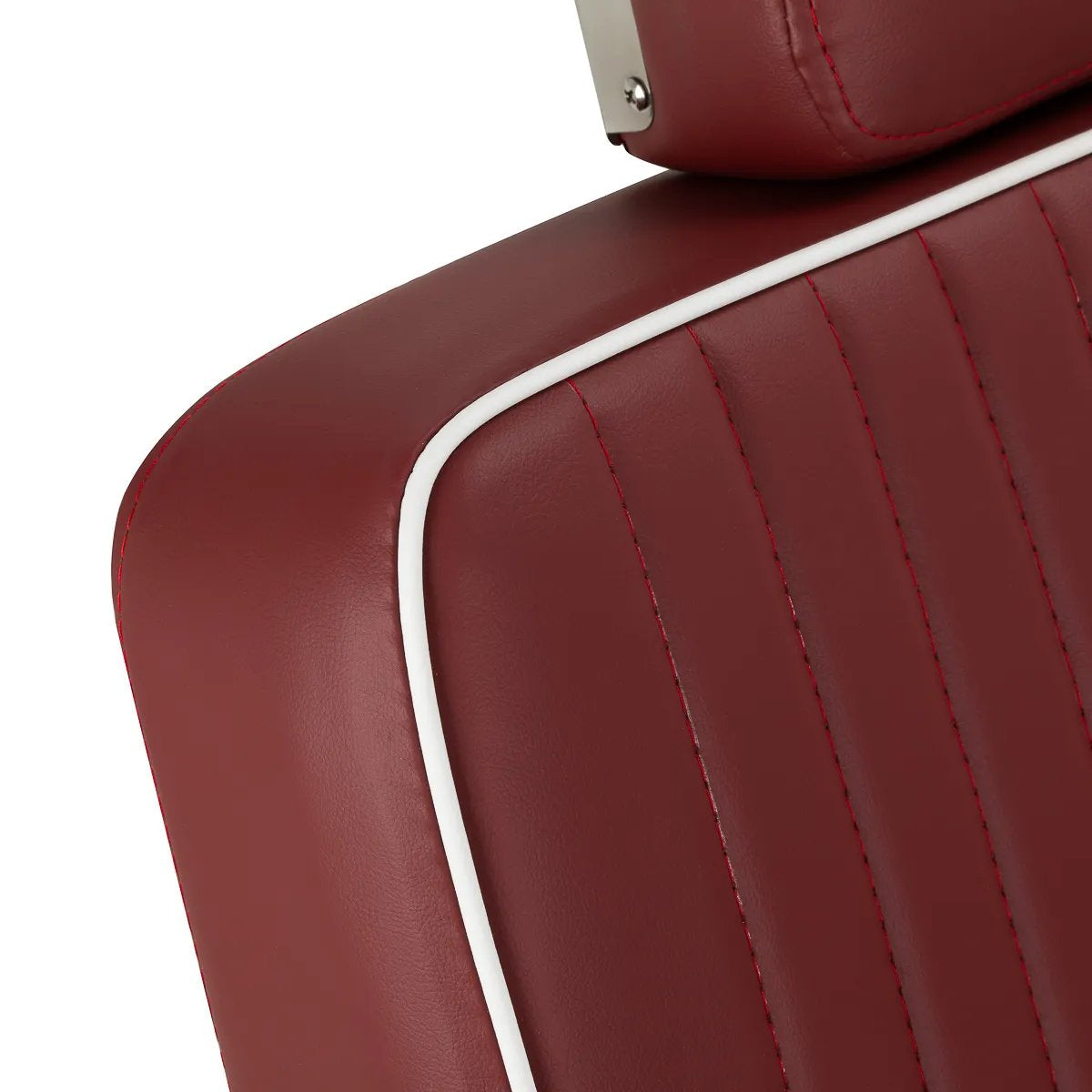 Close-up of the red upholstery, stitching and white piping
